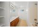 Bathroom with double vanity, tiled floors, and shower/tub combination at 2206 S 114Th Ln, Avondale, AZ 85323