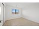 Bedroom featuring horizontal blinds and tiled floors at 2206 S 114Th Ln, Avondale, AZ 85323