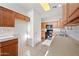 Kitchen boasts ample cabinetry, tile flooring, and modern appliances at 2206 S 114Th Ln, Avondale, AZ 85323