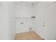 Bright laundry room with tile floors and convenient hookups at 2206 S 114Th Ln, Avondale, AZ 85323