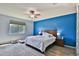 Primary bedroom featuring ceiling fan, and large window at 2221 W Madisen Marie Ave, Queen Creek, AZ 85144