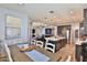 Open-concept kitchen, dining, and living space, perfect for modern living at 2221 W Madisen Marie Ave, Queen Creek, AZ 85144