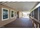 Spacious covered deck with wood flooring, offering outdoor living and entertaining at 2233 E Behrend Dr # 84, Phoenix, AZ 85024