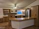 Inviting kitchen with stylish cabinets, stainless steel appliances, and a breakfast bar at 2233 E Behrend Dr # 84, Phoenix, AZ 85024