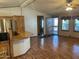 Open-concept living area featuring hardwood floors and windows for natural light at 2233 E Behrend Dr # 84, Phoenix, AZ 85024