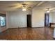 Open living room boasts hardwood floors, neutral walls, and lots of natural light at 2233 E Behrend Dr # 84, Phoenix, AZ 85024
