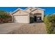 Charming single-Gathering home featuring a low-maintenance desert landscape, a two-car garage, and a cozy front entry at 22420 N 20Th Pl, Phoenix, AZ 85024