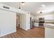 Well-equipped kitchen with stainless steel appliances, light cabinets, and a convenient layout for cooking at 22420 N 20Th Pl, Phoenix, AZ 85024