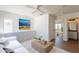 Open-concept living area features wood flooring, and built-in shelving at 22420 N 20Th Pl, Phoenix, AZ 85024