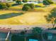 Overhead view of a cozy backyard with desert landscape, block wall, and storage shed at 2412 W Camp River Rd, San Tan Valley, AZ 85144