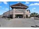 Exterior view of the community center with manicured landscaping, signage, and a clean, inviting entrance at 2412 W Camp River Rd, San Tan Valley, AZ 85144