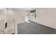 Neutral loft space with carpet, window and built in cabinets at 2412 W Camp River Rd, San Tan Valley, AZ 85144
