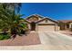 Charming single-Gathering home featuring a desert-style landscape, a two-car garage, and a neutral color palette at 24806 W Hidalgo Dr, Buckeye, AZ 85326