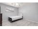 Neutral bedroom with tile floors, window with blinds, and light gray walls at 2750 W Turney Ave, Phoenix, AZ 85017