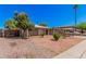 Charming single-story home with a covered carport and low maintenance desert landscaping at 2750 W Turney Ave, Phoenix, AZ 85017