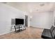 This living room is spacious and features tile floors and neutral wall colors at 2750 W Turney Ave, Phoenix, AZ 85017