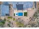Aerial view of a sparkling pool, patio, and desert landscaping at 31226 N Granite Reef Rd, Scottsdale, AZ 85266
