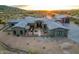 Beautiful desert home featuring professional landscaping and a circular driveway at 31226 N Granite Reef Rd, Scottsdale, AZ 85266