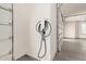 EV charger installed in a bright, clean garage with a modern door, perfect for electric vehicle owners at 31226 N Granite Reef Rd, Scottsdale, AZ 85266