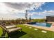 Beautiful pool features lounge chairs and desert views, ideal for relaxation and outdoor enjoyment in a serene setting at 31226 N Granite Reef Rd, Scottsdale, AZ 85266