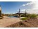 Sparkling pool surrounded by desert landscape creates a serene oasis for relaxation and recreation in a natural setting at 31226 N Granite Reef Rd, Scottsdale, AZ 85266