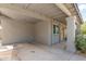 Attached carport, offering covered parking, and lovely desert landscaping leading to the front door at 313 W Utopia Rd, Phoenix, AZ 85027