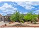 Inviting home exterior showcasing mature trees and a well-maintained yard at 313 W Utopia Rd, Phoenix, AZ 85027