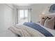 Comfortable bedroom with a plush bed, ample natural light, and closet space at 3511 E Baseline Rd # 1214, Phoenix, AZ 85042