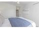 Bright bedroom with an inviting bed, walk-in closet, and neutral decor at 3511 E Baseline Rd # 1214, Phoenix, AZ 85042