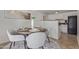 Charming dining area with seating for four and modern decor at 3511 E Baseline Rd # 1214, Phoenix, AZ 85042
