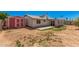 View of the backyard featuring a storage shed and a concrete patio extending from the house at 3540 E Dolphin Ave, Mesa, AZ 85204