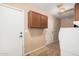 Functional laundry area offering storage and functionality at 3540 E Dolphin Ave, Mesa, AZ 85204