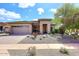 Charming single-story home with well-manicured desert landscaping and inviting curb appeal at 35707 N 34Th Ln, Phoenix, AZ 85086