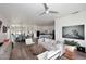Open floor plan showcases living, dining, and kitchen areas with modern furnishings and ample natural light at 35707 N 34Th Ln, Phoenix, AZ 85086