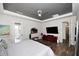 Comfortable main bedroom with modern decor, wooden floors, and ample natural light at 35707 N 34Th Ln, Phoenix, AZ 85086