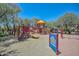 Community playground with slides, climbing structures, and swings for active outdoor fun at 35707 N 34Th Ln, Phoenix, AZ 85086