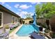 Sparkling pool with desert landscaping, lounge chairs and blue sky at 35707 N 34Th Ln, Phoenix, AZ 85086