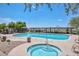 Community pool and spa area, featuring a luxurious hot tub with tiled accents at 35707 N 34Th Ln, Phoenix, AZ 85086
