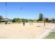 Enjoy a game of volleyball on this well-maintained sand court within the community at 35707 N 34Th Ln, Phoenix, AZ 85086