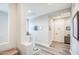 Bright hallway with neutral paint, wood-look floors, recessed lighting, and decorative artwork at 3879 E Harrison St, Gilbert, AZ 85295