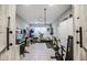 Finished home gym with plenty of natural light and modern exercise equipment at 3879 E Harrison St, Gilbert, AZ 85295