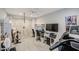 Functional home gym featuring a ceiling fan and modern exercise equipment at 3879 E Harrison St, Gilbert, AZ 85295