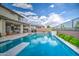 Large backyard pool with diving board, patio, and covered seating area that creates an ideal outdoor space at 3879 E Harrison St, Gilbert, AZ 85295