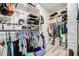 Well-organized walk-in closet with shelves and rods for ample clothing storage at 3879 E Harrison St, Gilbert, AZ 85295