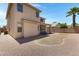 Low maintenance gravel backyard with covered patio seating area at 43860 W Roth Rd, Maricopa, AZ 85138