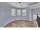 Bright loft with ample windows, wood flooring, and views at 43860 W Roth Rd, Maricopa, AZ 85138