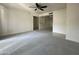 Bright living room with plush carpet and convenient access to the kitchen at 4444 E Paradise Village N Pkwy # 251, Phoenix, AZ 85032