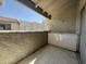 Enclosed outdoor patio area with tiled flooring and outdoor storage cabinet at 4444 E Paradise Village N Pkwy # 251, Phoenix, AZ 85032