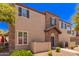 Charming two-story home with stone accents, landscaping, and a private balcony at 4752 E Portola Valley Dr # 103, Gilbert, AZ 85297