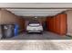 Spacious garage with ample storage cabinets and a car parked inside at 4752 E Portola Valley Dr # 103, Gilbert, AZ 85297